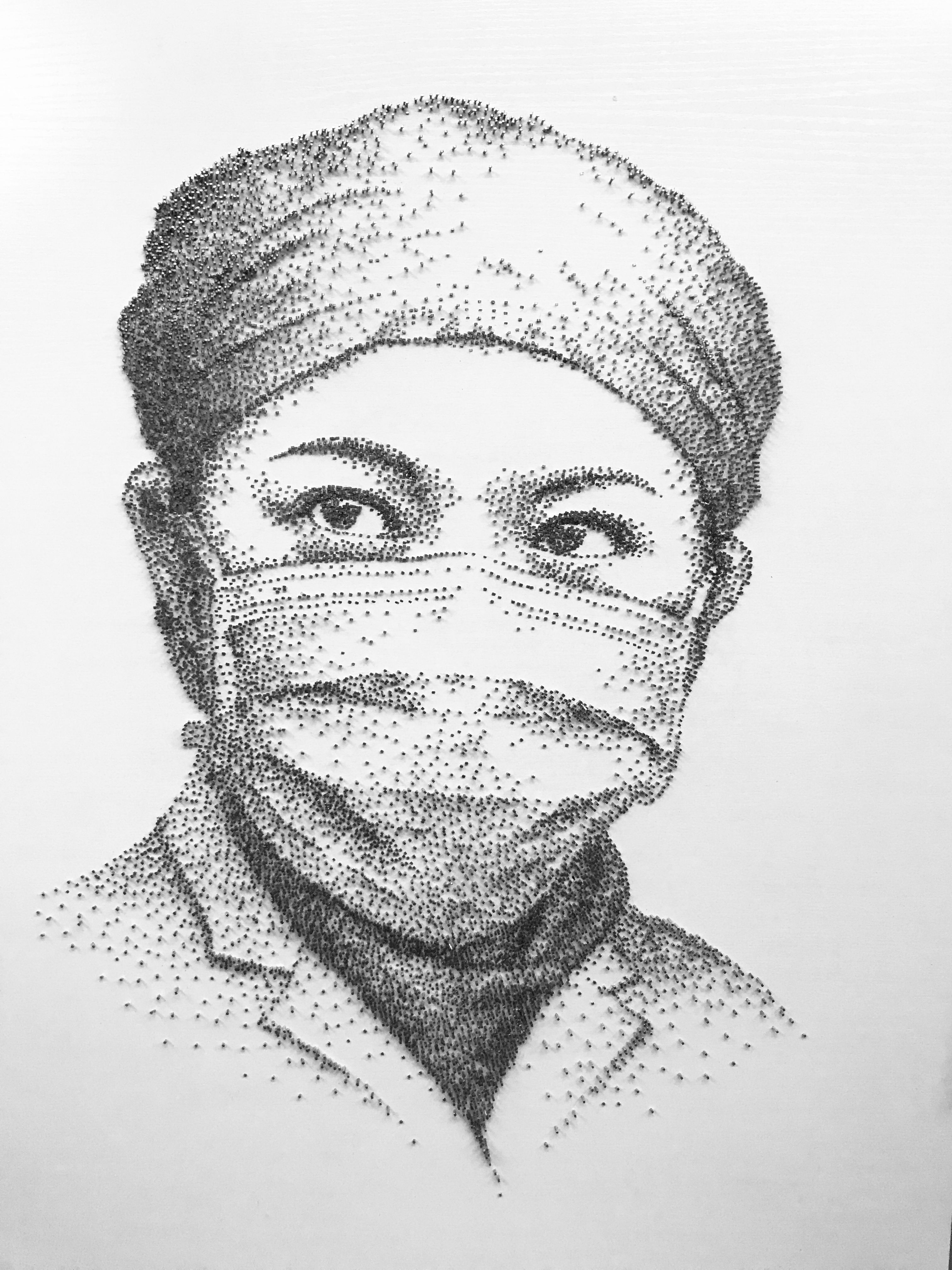 用9万颗钉子画画 中山老师上热搜!